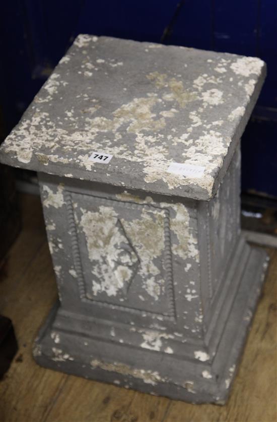 A stone plinth H.51cm